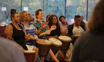 A drum circle at a Healing in African Diaspora event.